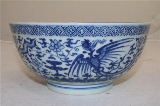 A Chinese blue and white phoenix bowl , Kangxi/Yongzheng period, 21.5cm, cracks